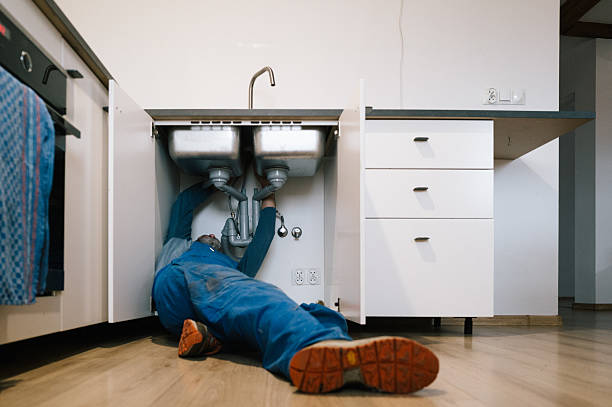 Professional Emergency Plumber technician working in Deerfield, MI
